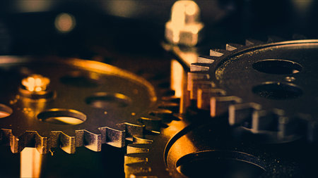 High-quality industrial grunge background featuring rusty, interlocking vintage metal gears and cogs. This gritty steampunk aesthetic symbolizes complex systems, historical machinery, teamwork, and the mechanical foundations of law, justice, and global order