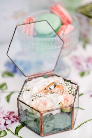 Still life brides morning, dish with cup of tea, champagne glass, wedding rings and flower bouquet. Designer decorの写真素材