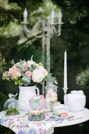 Still life brides morning, dish with cup of tea, champagne glass, wedding rings and flower bouquet. Designer decorの写真素材