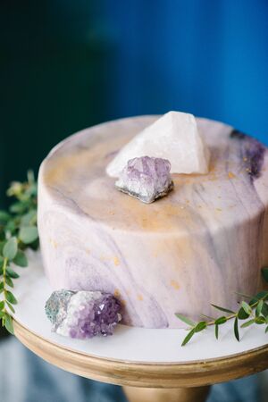 Elegant marble cake with stones, crystals. Wedding or birthday bakeryの写真素材