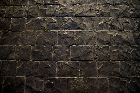 Grey brick wall background texture.
