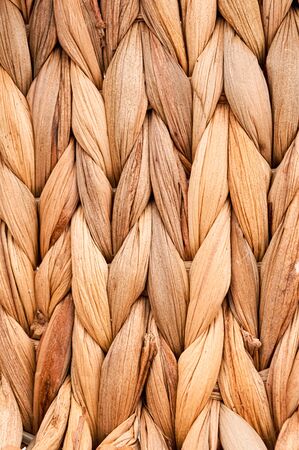 Rustic natural wicker texture. Braided pattern macro photography. Ecological materials design.の写真素材