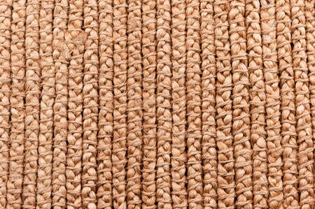 Rustic natural wicker texture. Braided pattern macro photography. Ecological materials design.