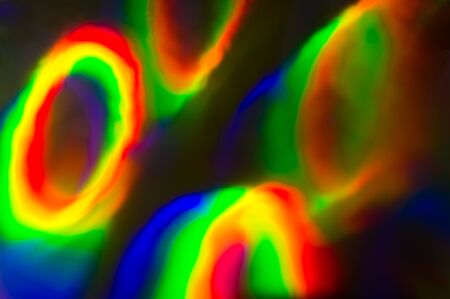 Holographic, goniochromism macro rainbow texture. Ligh leaks, disco illumination effect. Abstract...