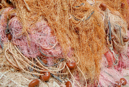Some fishnets create a pleasant colored composition with warm colors. Closeup allows to see the...