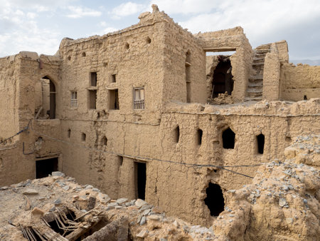 Panoramic view of several ancient mud brick houses ruins in Al Hamra, Omanのeditorial素材