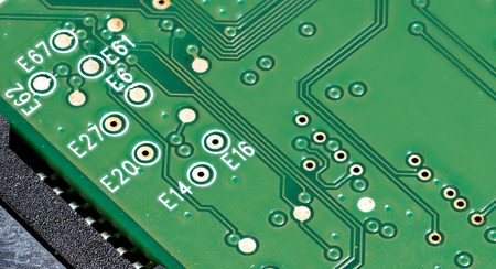 Closeup of green computer mother board, electronic elements and circuit