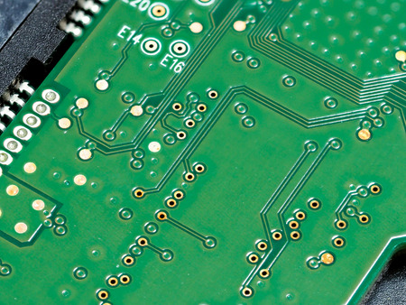 Closeup of green computer mother board, electronic elements and circuit