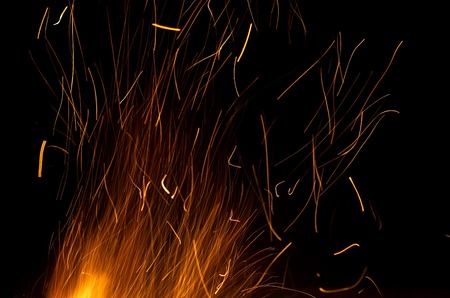 long fiery sparks at night