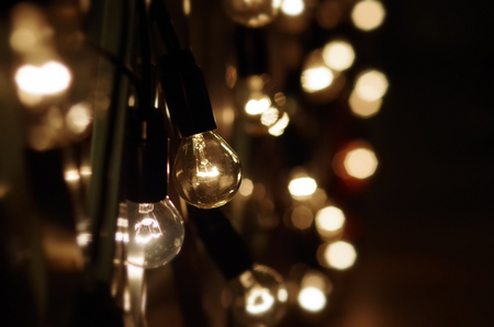 retro incandescent lamps at darknessの写真素材