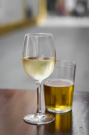 fried anchovies, white wine and beer at a street bar, Seville, Spainの写真素材