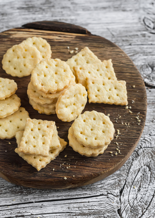 Homemade cheese cookies on a wooden rustic backgroundの写真素材