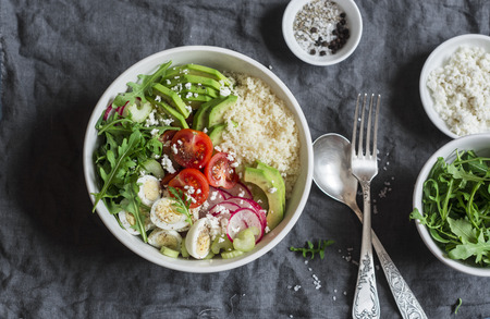 Couscous and vegetables bowl. Healthy, diet, vegetarian food concept. Top viewの写真素材