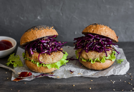 Vegetarian white bean burgers on wooden background.の写真素材