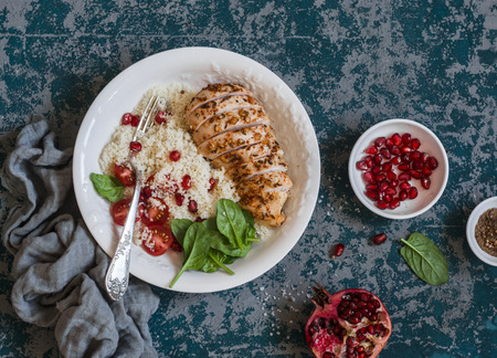 Baked chicken breast with cous cous. Delicious healthy diet food conceptの写真素材