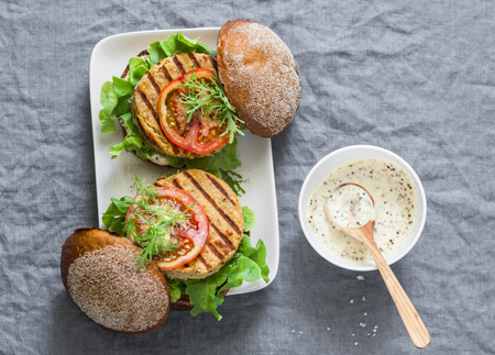 Vegetarian burgers - chickpea and cauliflower burgers on a gray background, top view. Flat layの写真素材