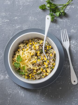 Mexican quinoa corn salad cheese on grey background, top view. Vegetarian food conceptの写真素材