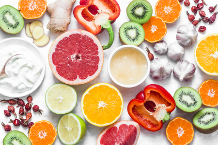 Immunity  boosting food set on a light background . Healthy lifestyle concept, winter prevention of colds. Flat lay, top viewの写真素材