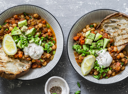 Vegetarian mushrooms chickpea chili on a gray background, top view. Healthy vegetarian food conceptの写真素材