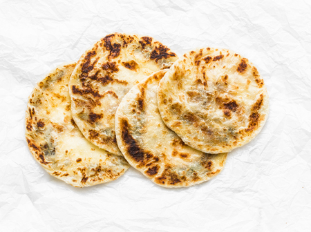 Indian paratha flatbread on a light background, top viewの写真素材