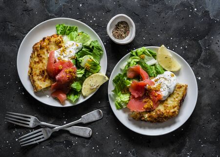 Potato tortilla with greek yogurt, smoked salmon and green salad. Delicious breakfast, appetizer, tapasの写真素材