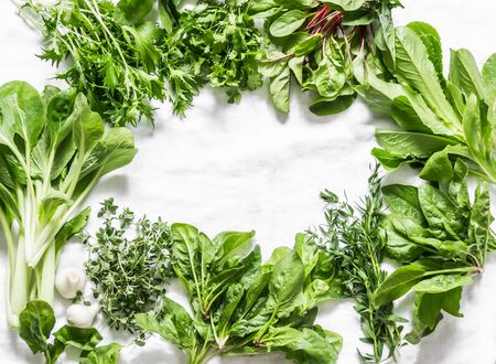 Food garden herbs background with copy space on a light background, top view. Flat layの写真素材
