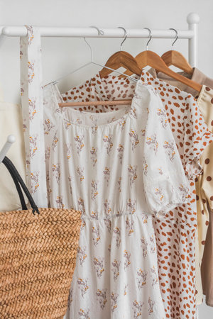 Beautiful summer dress in retro style on a hanger. Women's eco-style clothingの写真素材