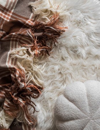 Cozy blankets, decorative pillows - cozy seasonal home decor, top view