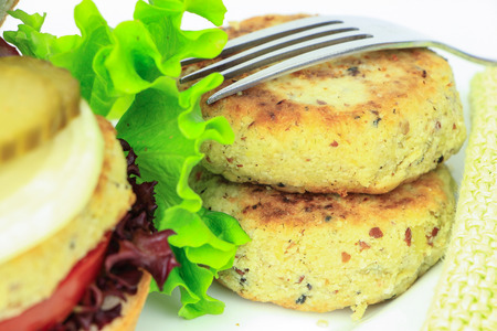 Vegan sea burger patties closeup on white backgroundの写真素材