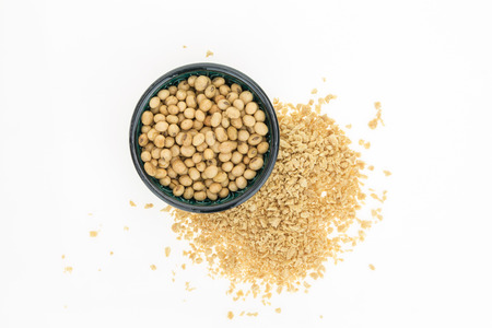 Soybeans in bowl and dry soya mince, isolated on white background.の写真素材
