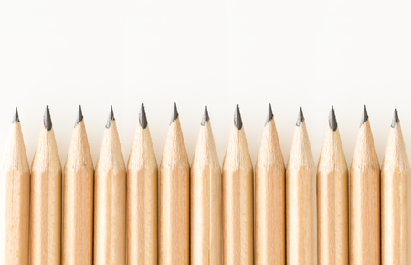 Bunch of good sharpened graphite pencils, on white background with copy-space.の写真素材