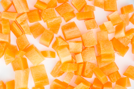 Sliced carrots on white, closeup background.の写真素材