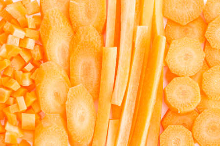 Sliced carrots on white, closeup background.の写真素材