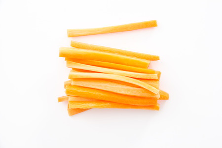Sliced carrots on white background.の写真素材
