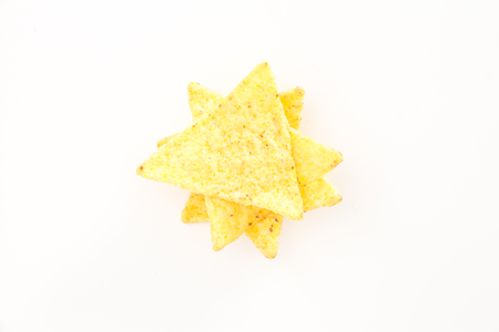 Crispy nacho chips, on white background.の写真素材