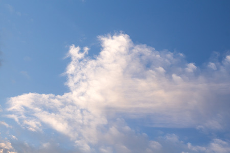 Soft, fluffy clouds formation, on blue sky background.の写真素材