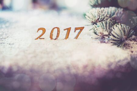 Wooden 2017 figures on wood table, Christmas and new year theme.の写真素材