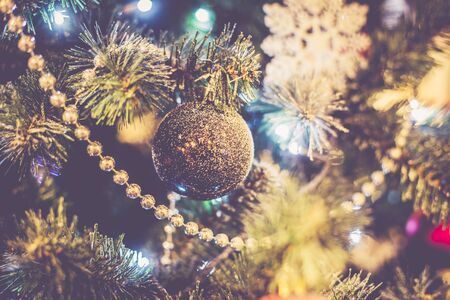 Black Christmas ball on the Christmas treeの写真素材