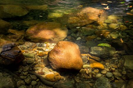 clean water and stonesの写真素材