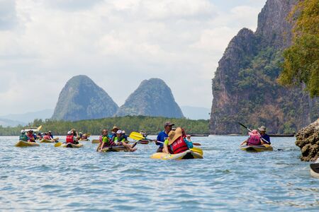 Phuket, Thailand - February 19, 2017: Tourists kayaking among limestone islands Andaman Seaのeditorial素材