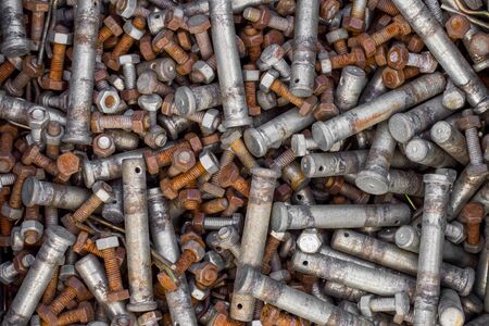 Old rusty bolts and nutsの写真素材