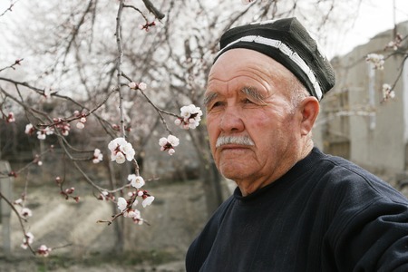 Bukhara, Uzbekistan - March 08, 2009: Portrait of unidentified Uzbek man in the national hat...