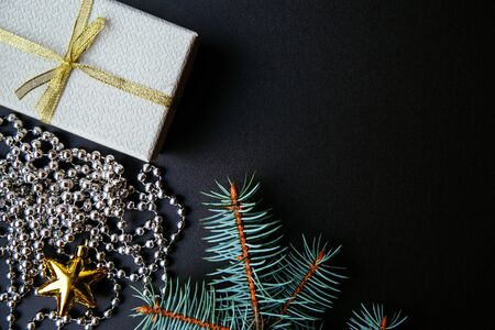 Christmas or New Year dark background, Xmas black board framed with season decorationsの写真素材