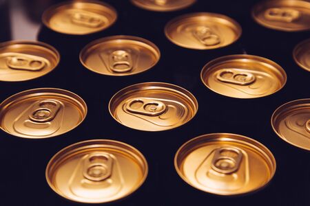 metal beer cans background blackの写真素材