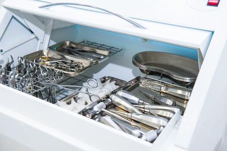 Close-up of chamber for sterile storage of medical and surgical tools in the dentist's office. Surgery. Dentistry. Selective focusの写真素材