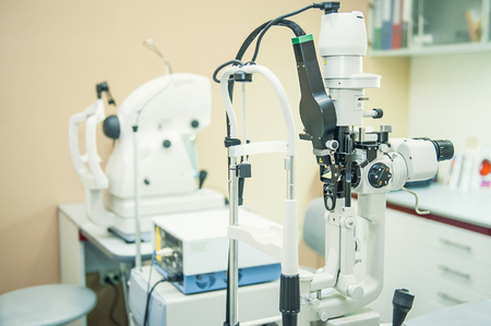 Professional optometrist diopter tool in an optician laboratory. Medical and health concept....