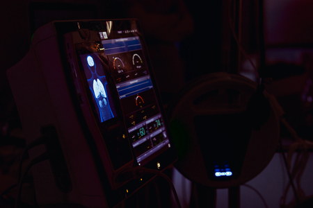 Close up illumination life support data on the modern heart, brain, kidneys screening examinations...