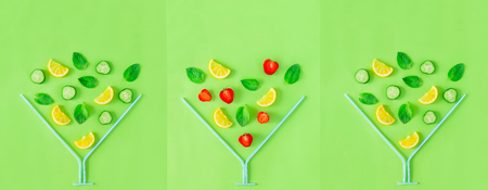 Wide creative banner. Three Strawberry and cucumber lemonade glasses made with straws with falling ingredients on green background. Summer drinks. Minimal food concept. Triptych. Copy spaceの写真素材