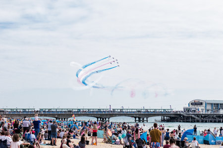 Red Arrows - Royal Air Force air plaines under Bournemouth beach during Bournemouth Air Festival 2018. BOURNEMOUTH, UK - AUGUST 31, 2018.のeditorial素材