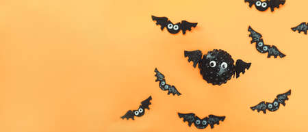 Model of Covid virus in the shape of a bat with flying bats in the background. Scariest hero in...